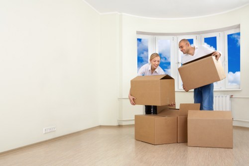 Furniture and boxes being loaded into a removals van
