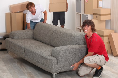 Packed moving boxes and furniture ready for a Streatham relocation